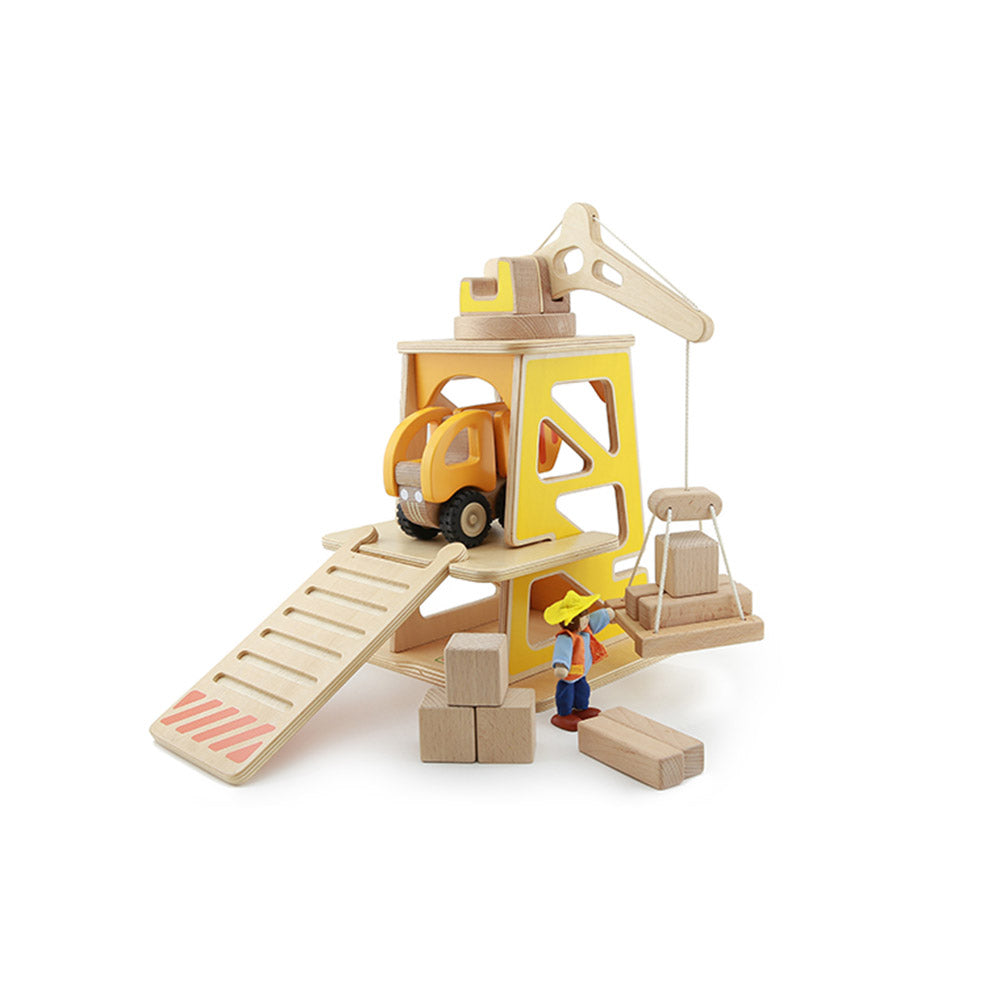 Wooden construction site playset featuring a movable tower crane.