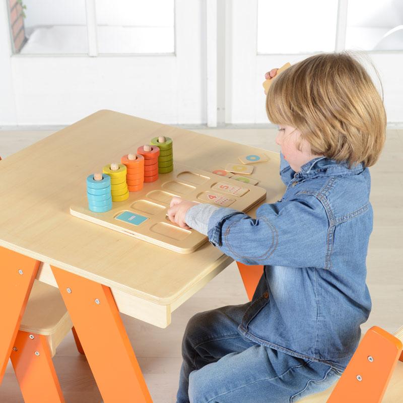 Montessori math learning board with colorful beads for preschoolers.