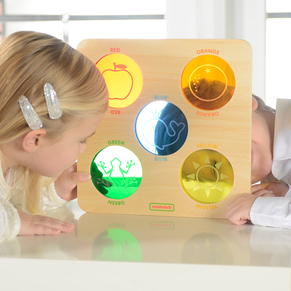 Close-up of wooden colour viewer frames with vibrant lenses.