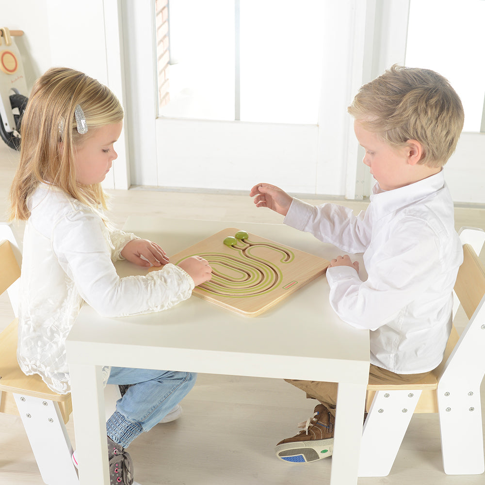 Close-up of wooden snail-shaped board with colorful sliding blocks.