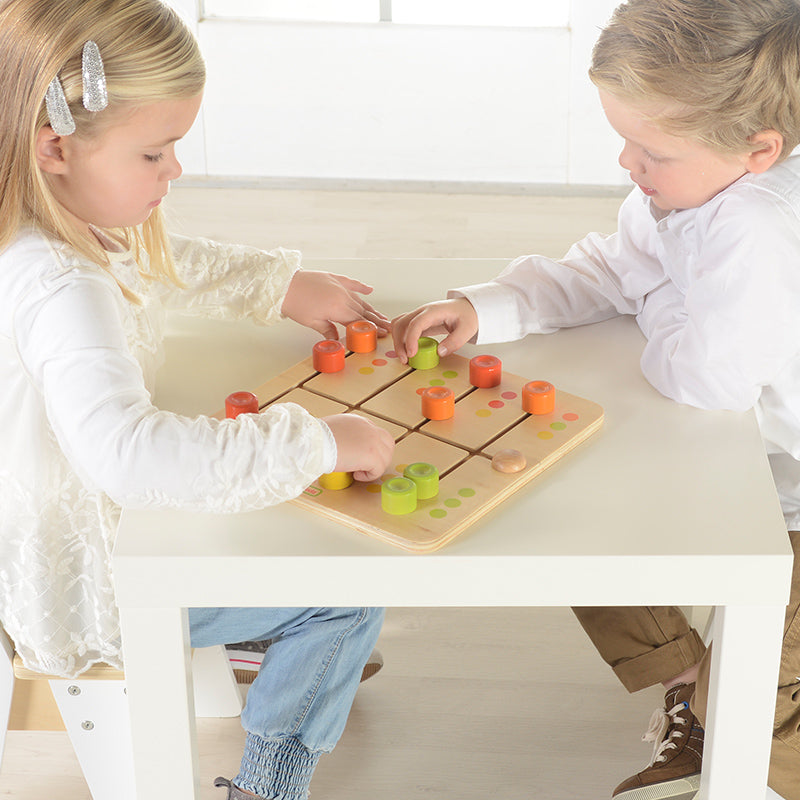 Masterkidz Colour Matching Sliding Game displayed on a learning table.