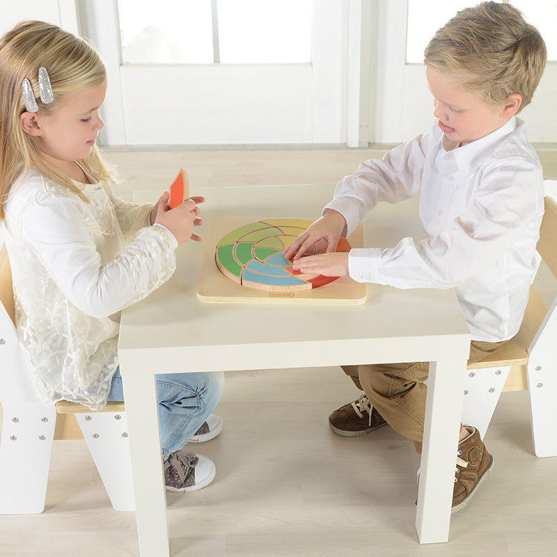 Masterkidz spiral wheel board displayed with all wooden pieces separated.