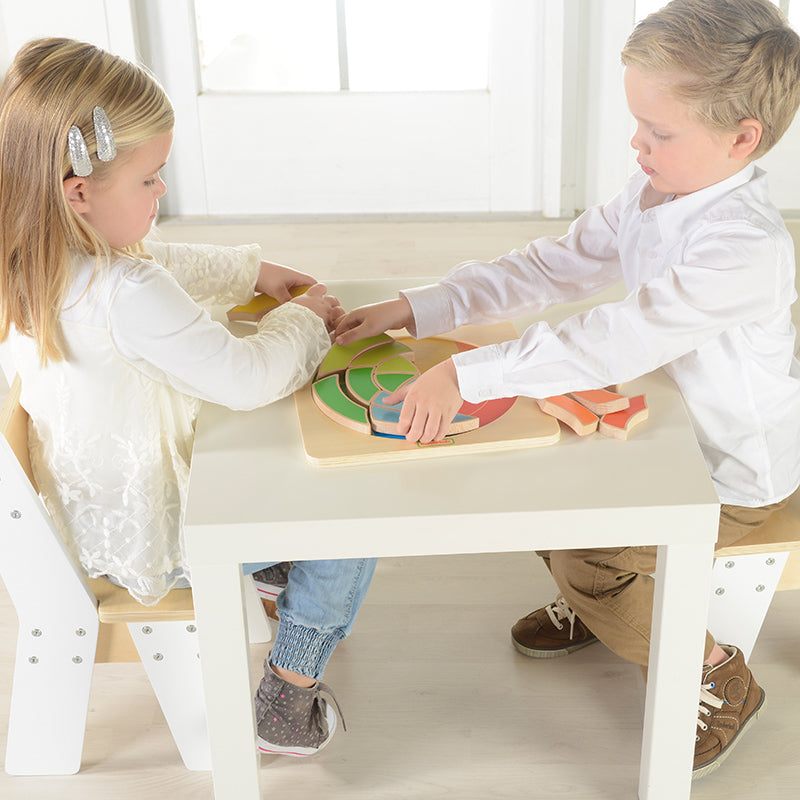 FSC-certified Beech Wood spiral puzzle pieces in rainbow colors.