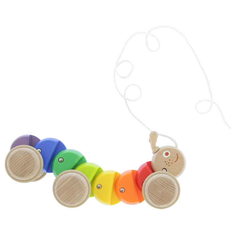 Toddler pulling wooden caterpillar toy for motor skills