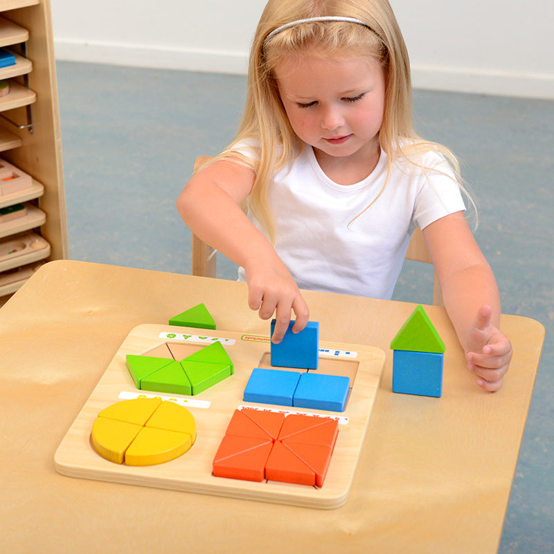 Children using Masterkidz geometric shapes board for creative learning at home
