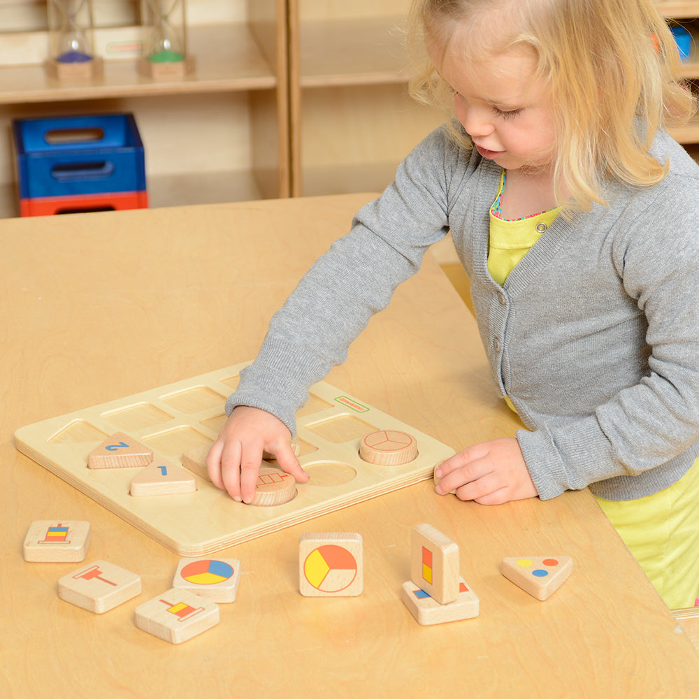 Preschool classroom scene with children practicing number and quantity recognition