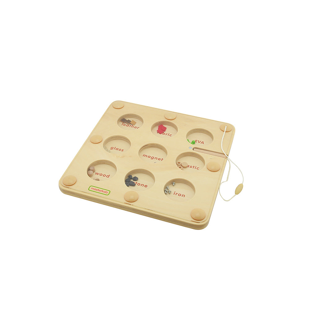 Board placed on a play table for interactive home science activities.