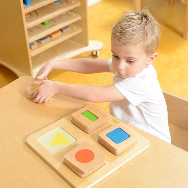 Blocks arranged in a Montessori classroom for cognitive skill development.