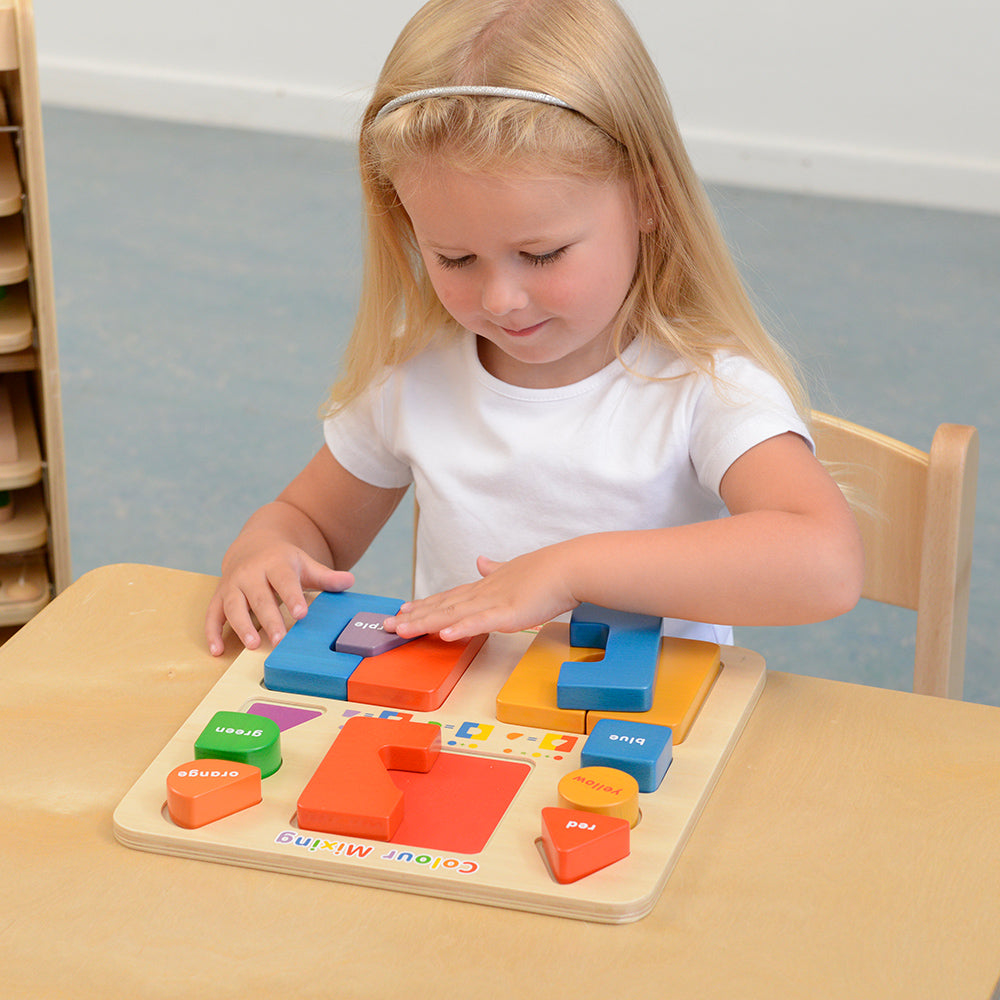 Close-up of vibrant, durable wooden blocks showing primary and secondary colours.
