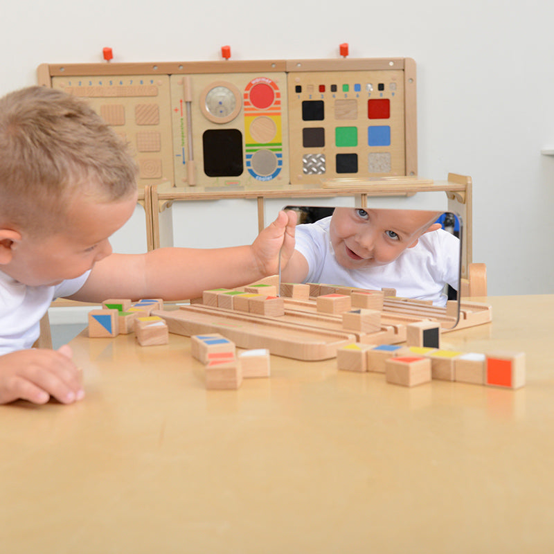 Wooden reflection learning board designed for early science play.