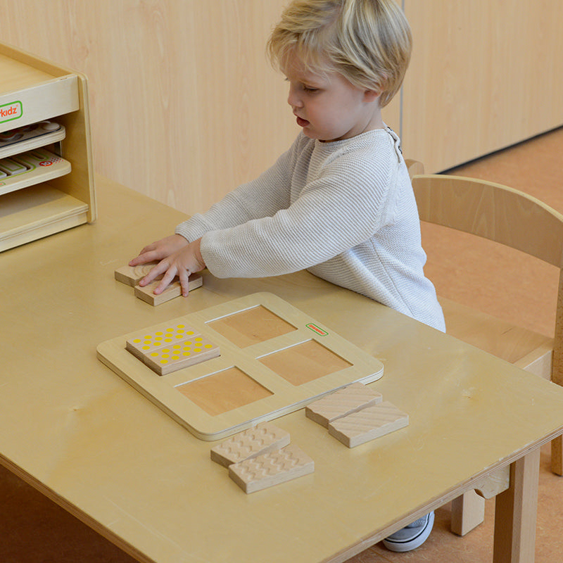 Masterkidz 2-Sided Tactile 'n Visual Matching Blocks on preschool table for sensory play