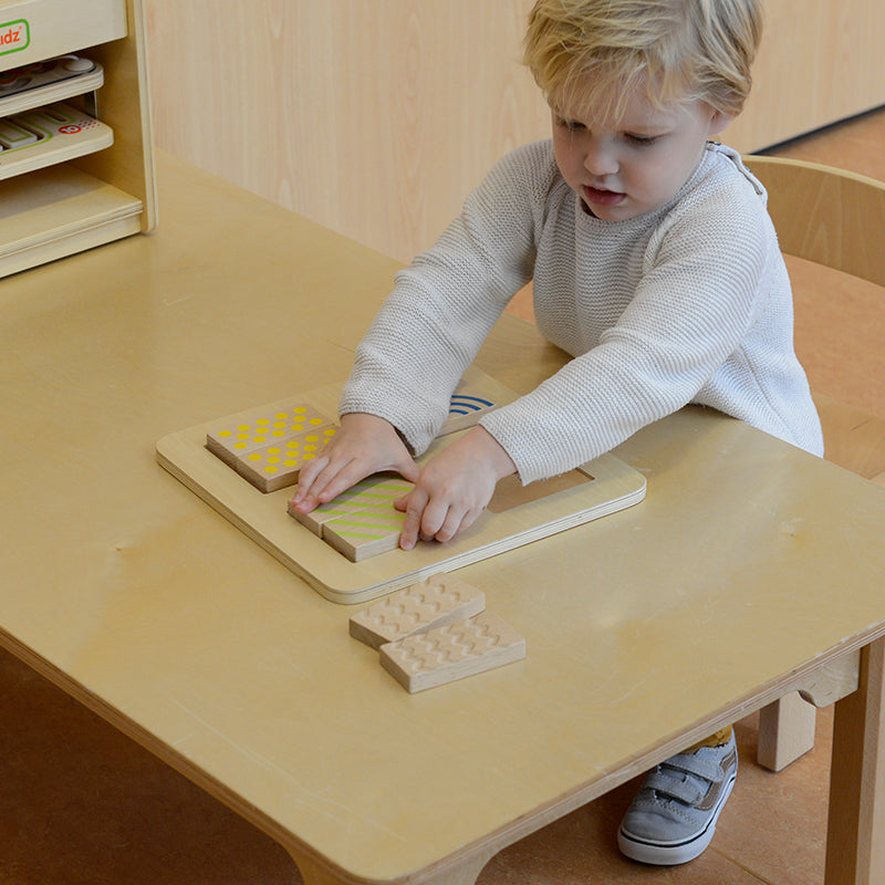 Children using Masterkidz tactile and visual matching blocks in classroom learning activity