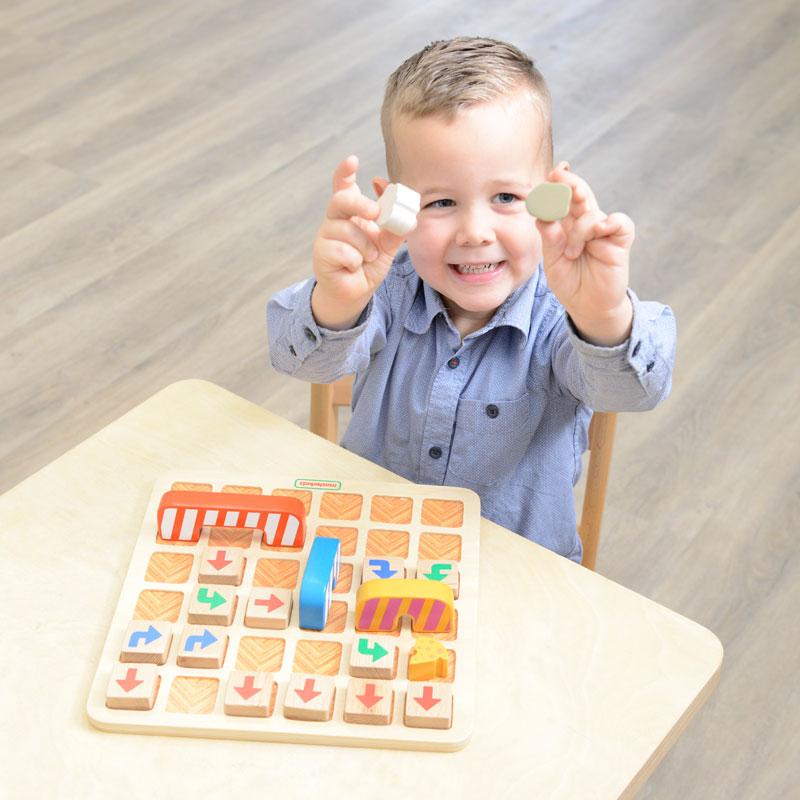 Child planning a step-by-step route for the mouse to reach the cheese.