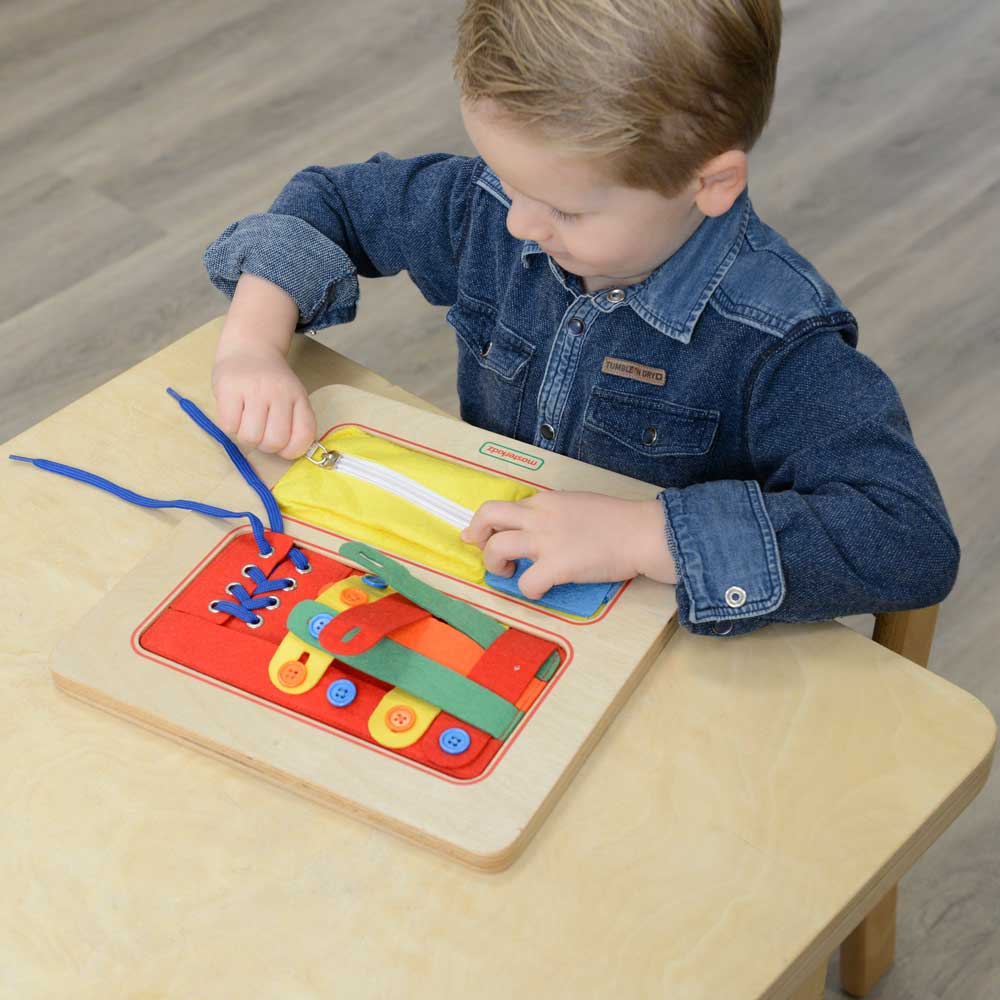 Wooden life skills board featuring zipper, buttons, laces, and weaving components.