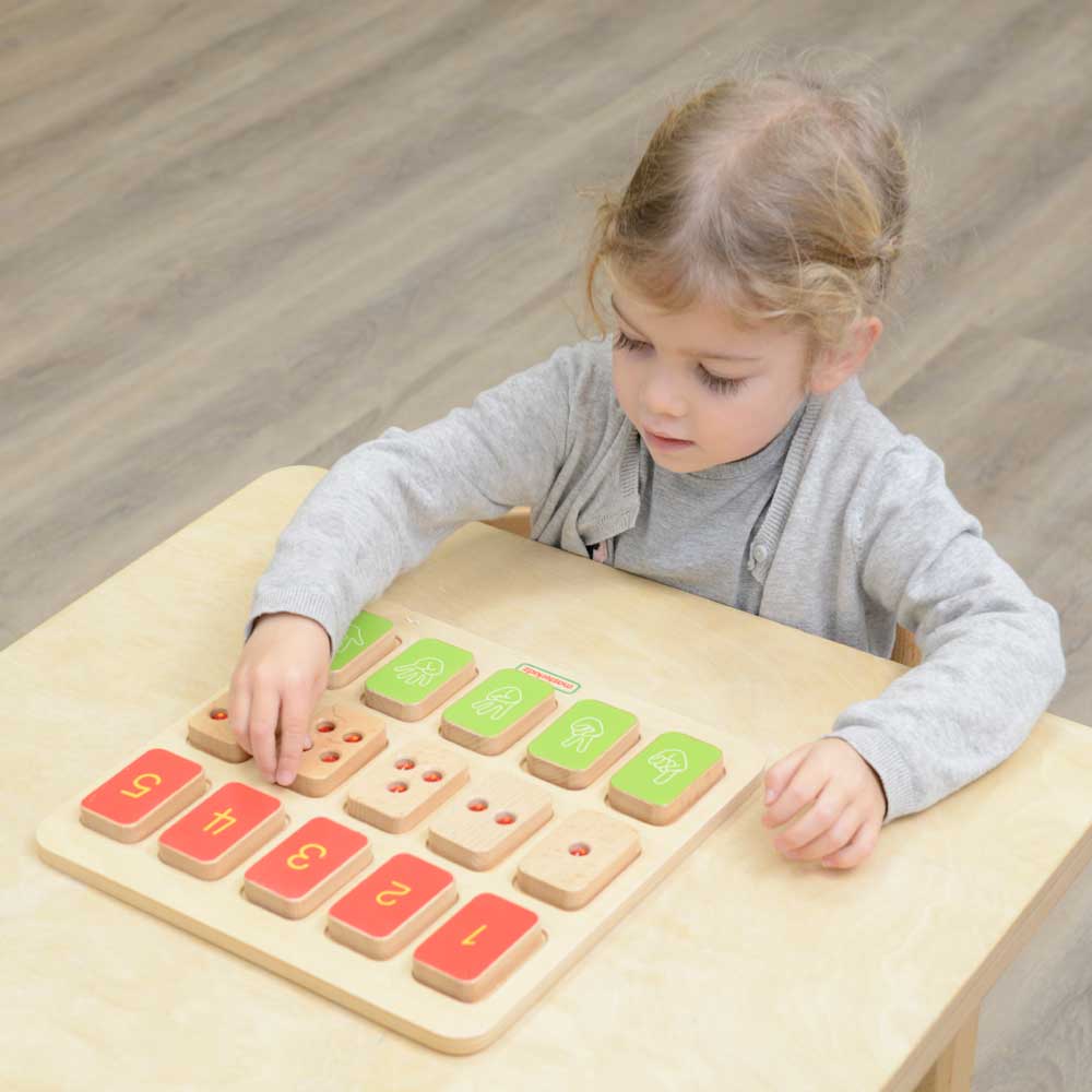 Tally mark and engraved number tiles enhancing number recognition skills.