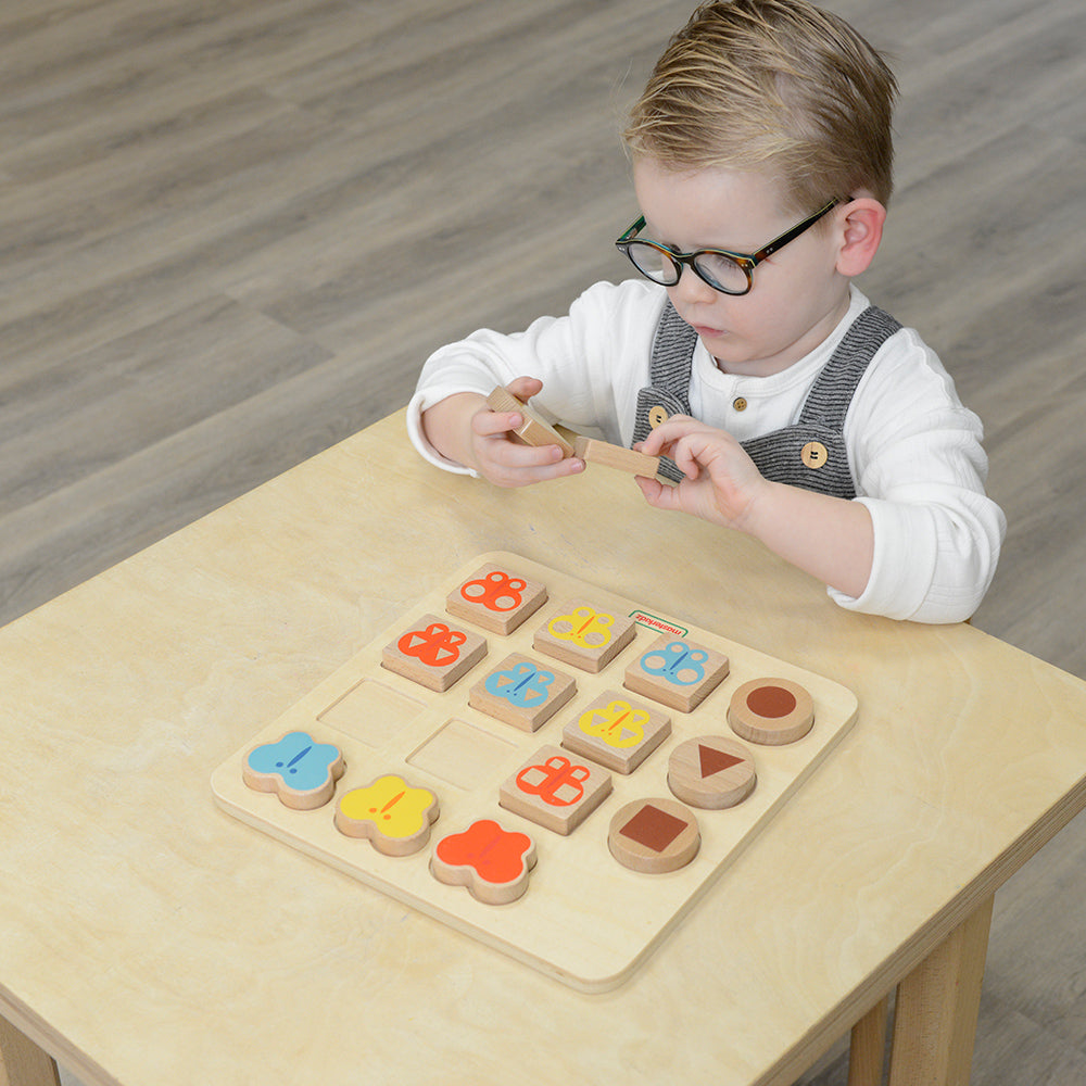 Montessori-inspired matching game promoting visual recognition and fine motor skills.