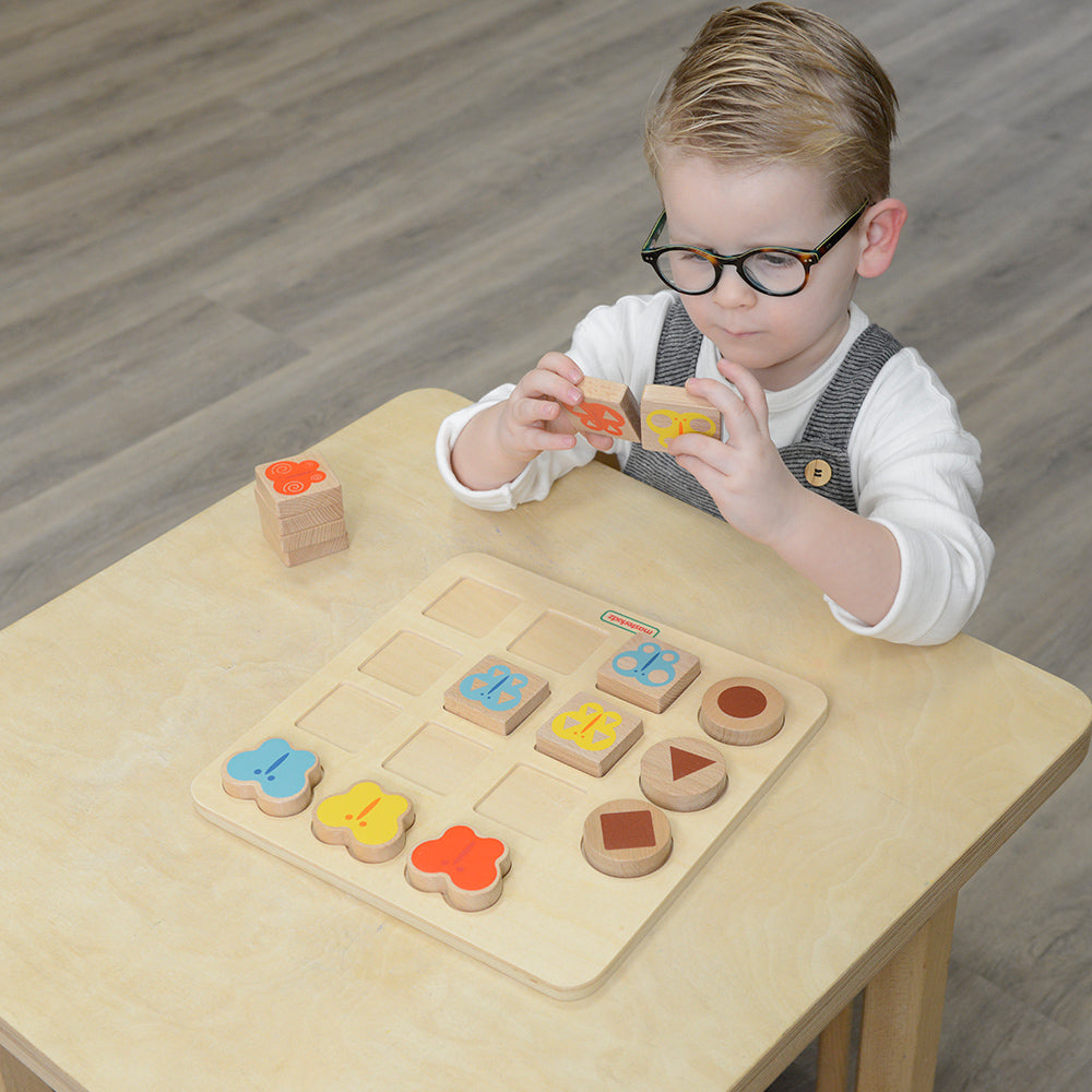 Durable wooden pieces featuring bright primary colours for sensory learning.