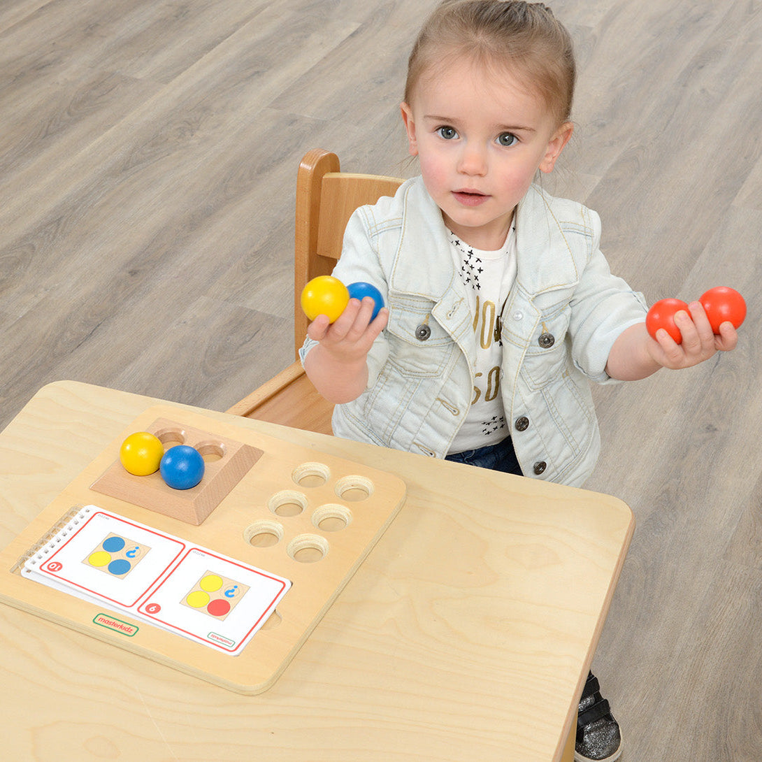 Three colour-coded tiers help children learn sequence and spatial order.