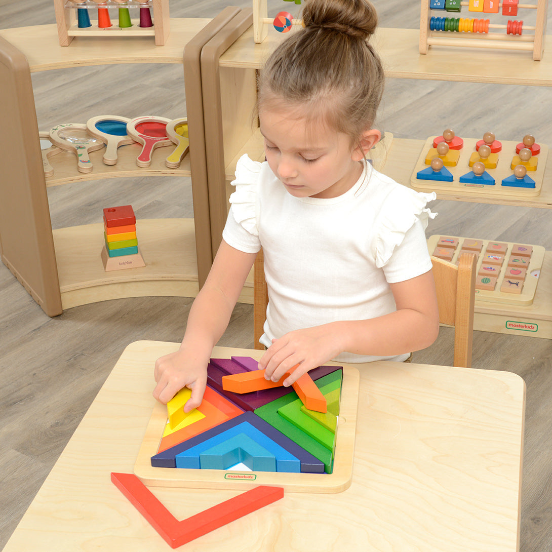 Children stacking wooden blocks in different colours and shapes with Masterkidz Pyramid Stacker.