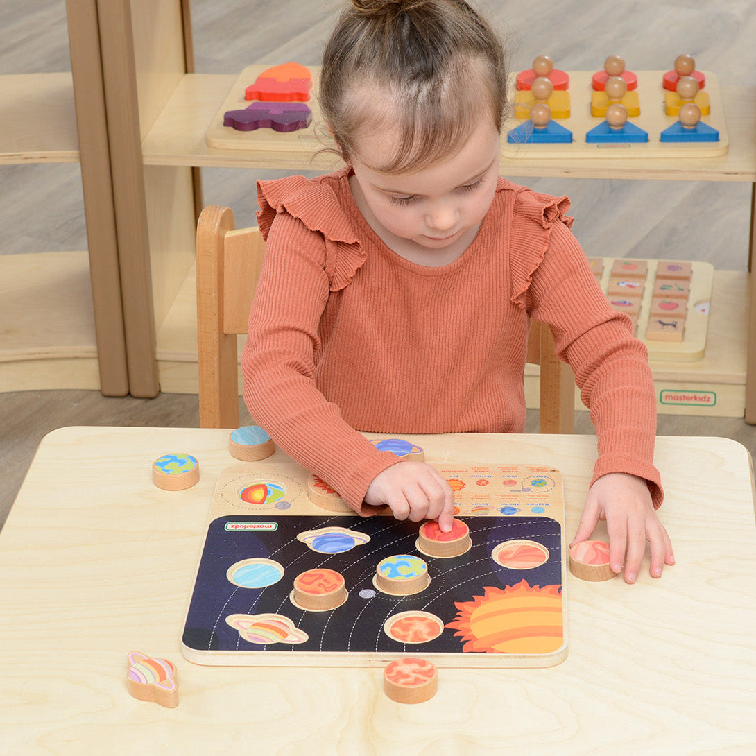 Interactive Masterkidz Solar System board with wooden planets, promoting early astronomy knowledge and cognitive development.