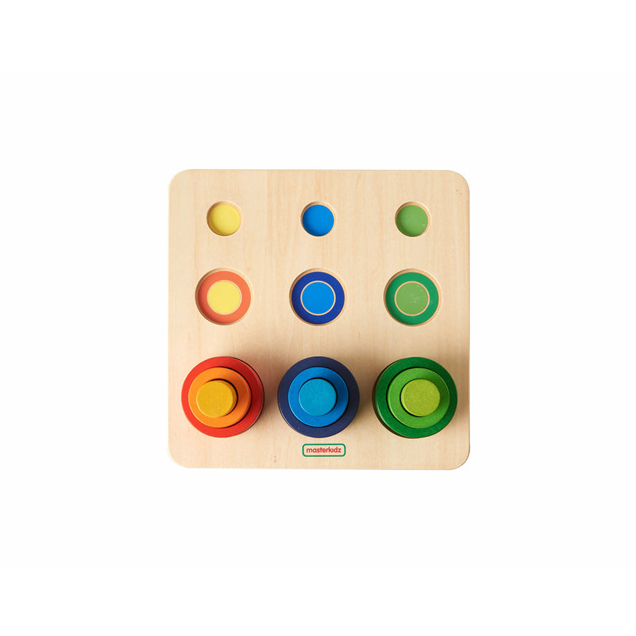 A full set of Masterkidz Nesting Wooden Tubes displayed on the colour-coded baseboard.