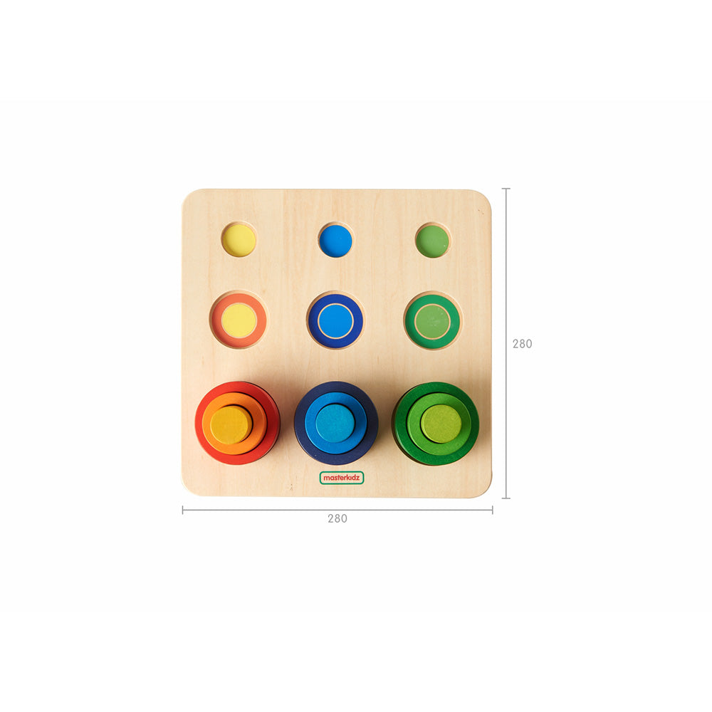 Small world play setup using the wooden tubes as buildings and props.