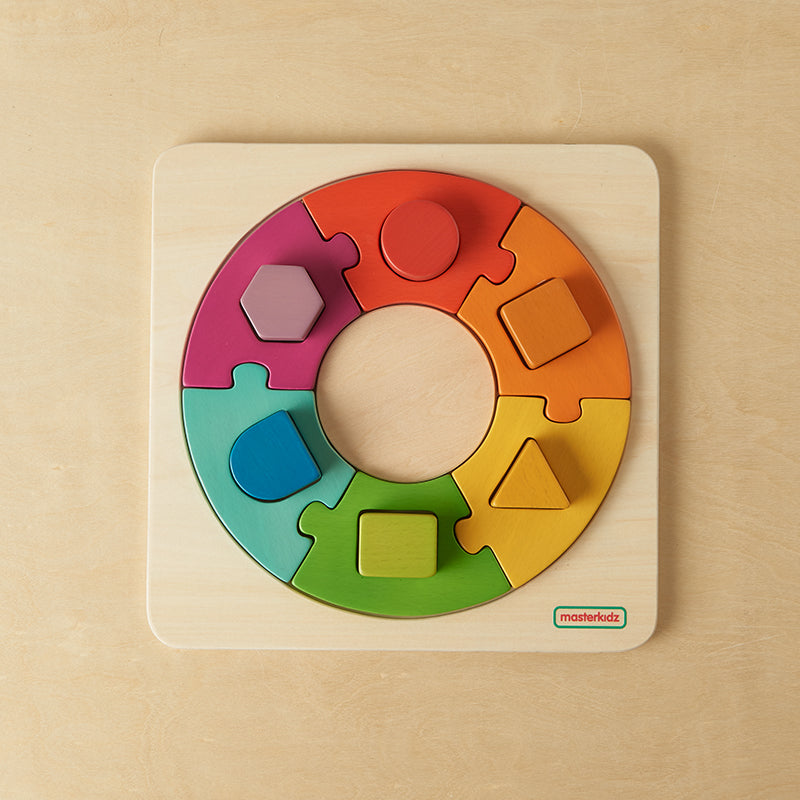 Shaped holes accept only the correct matching block