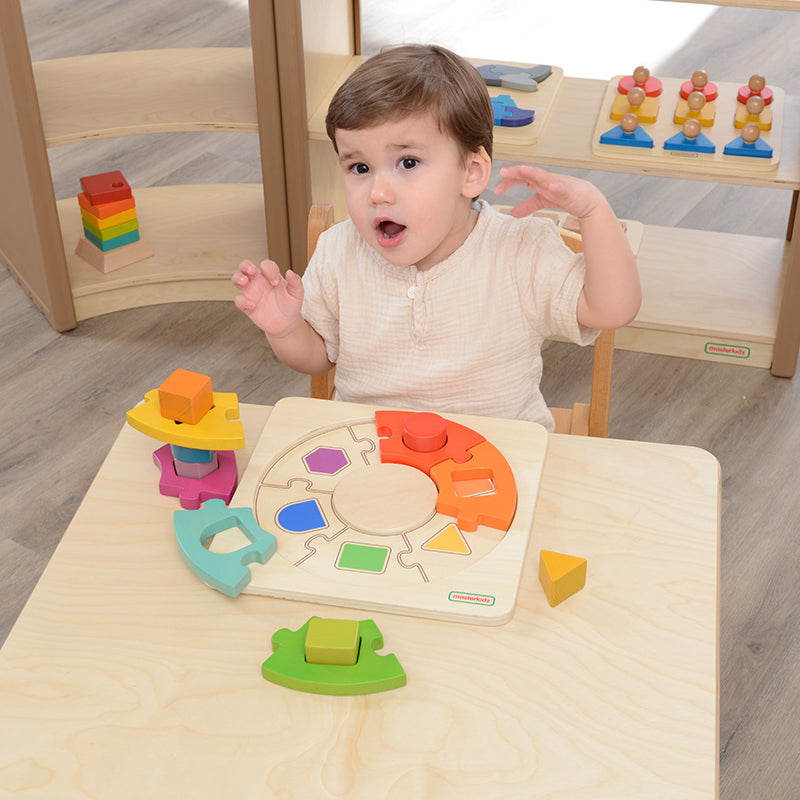 Donut-shaped baseboard for structured puzzle assembly.