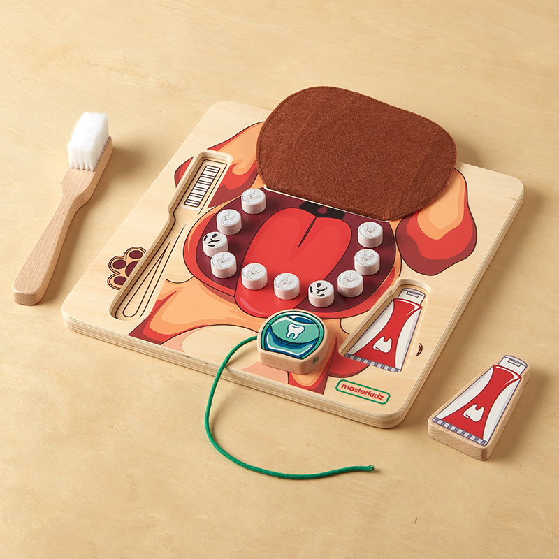 Preschool children role-playing teeth cleaning and practicing oral hygiene skills.